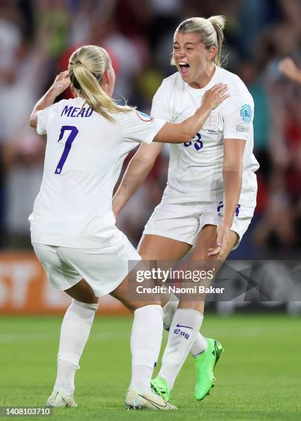 Alessia Russo celebrates with Beth Mead of England after scoring their team's seventh goal during the UEFA Women's Euro 2022 group A match between...