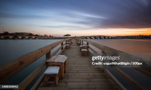 scenic view of sea against sky during sunset - nihat stock pictures, royalty-free photos & images