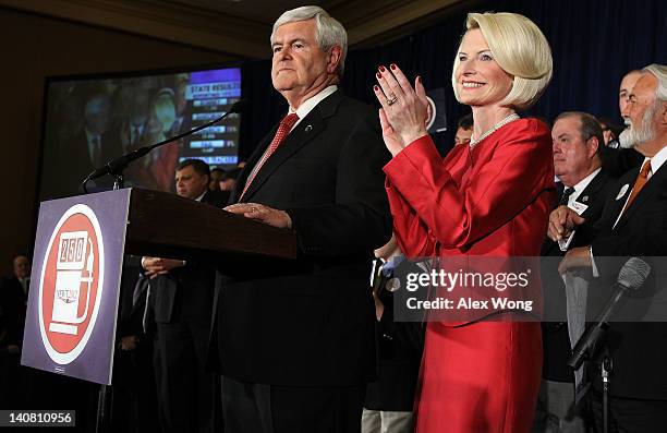 Republican presidential candidate and former Speaker of the House Newt Gingrich speaks as his wife Callista Gingrich listens after being declared the...