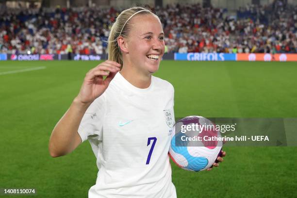 Beth Mead of England picks up the match ball after their hat trick during the UEFA Women's Euro 2022 group A match between England and Norway at...