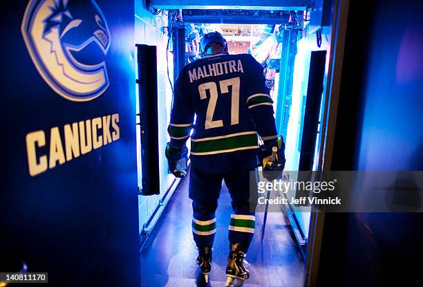 Manny Malhotra of the Vancouver Canucks leaves the dressing room before the NHL game against the Dallas Stars at Rogers Arena March 6, 2012 in...