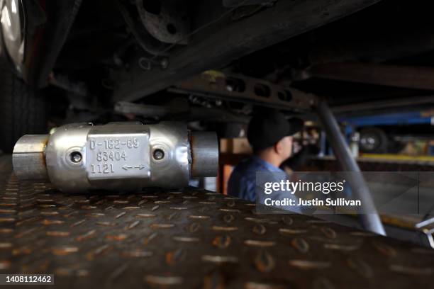 Brand new catalytic converter sits on a car lift at Johnny Franklin's Muffler on July 11, 2022 in San Rafael, California. Thefts of catalytic...