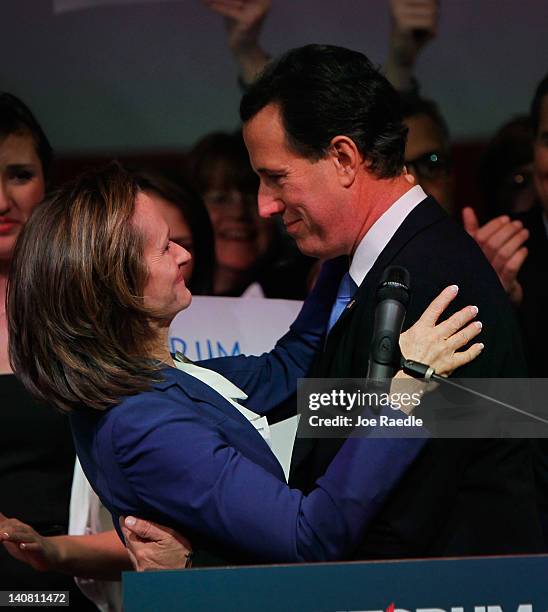 Republican presidential candidate, former U.S. Sen. Rick Santorum is hugged by his wife, Karen Santorum, during a primary night party at the...