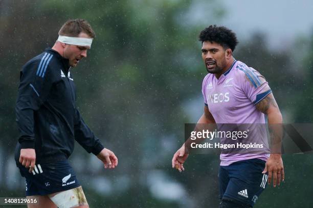Sam Cane and Ardie Savea look on during a New Zealand All Blacks training session at Hutt Recreation Ground on July 12, 2022 in Lower Hutt, New...