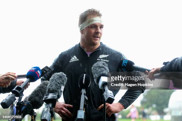 Sam Cane talks to media during a New Zealand All Blacks training session at Hutt Recreation Ground on July 12, 2022 in Lower Hutt, New Zealand.