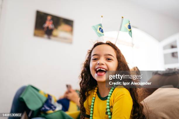 smiling brazilian girl to watch soccer game - brazil girls supporters stock pictures, royalty-free photos & images