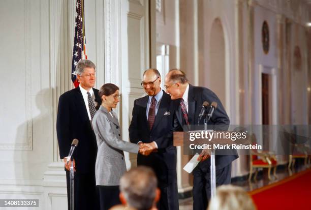 Ruth Bader Ginsburg is Sworn in as Associate Justice of the Supreme Court of the United States. President William Clinton stands behind her as her...