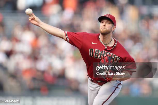 Merrill Kelly of the Arizona Diamondbacks pitches against the San Francisco Giants in the first inning at Oracle Park on July 11, 2022 in San...