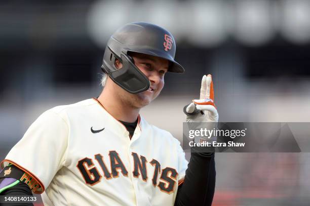 Joc Pederson of the San Francisco Giants waves to the Arizona Diamondbacks dugout before he bats in the first inning at Oracle Park on July 11, 2022...