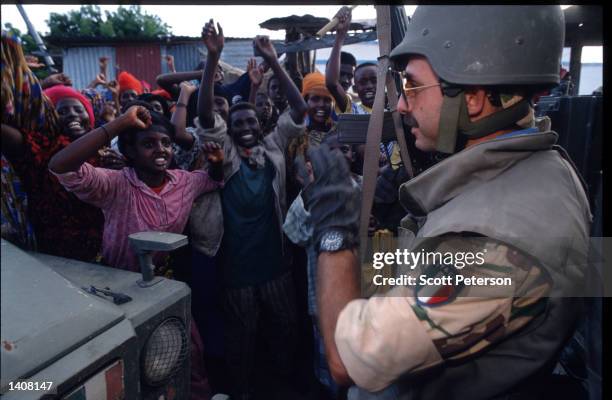 Soldier stands guard July 9, 1993 in Mogadishu, Somalia. Tension continues to escalate following the deadly skirmishes between Somali rebels and...