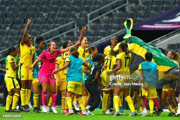 Players of Jamaica celebrate qualifying after the match between Jamaica and Haiti as part of the 2022 Concacaf W Championship at BBVA Stadium on July...