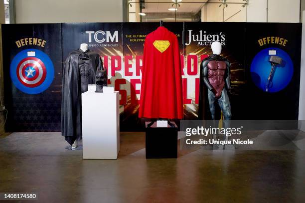 An original batsuit costume and cape produced for Val Kilmer as Batman in the Joel Schumacher film Batman Forever , an original silicone bat cowl...