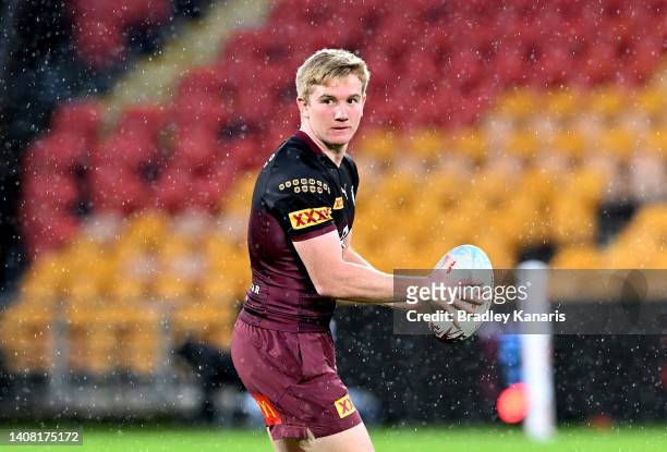 Tom Dearden looks to pass during a Queensland Maroons State of Origin training session at Suncorp Stadium on July 12, 2022 in Brisbane, Australia.