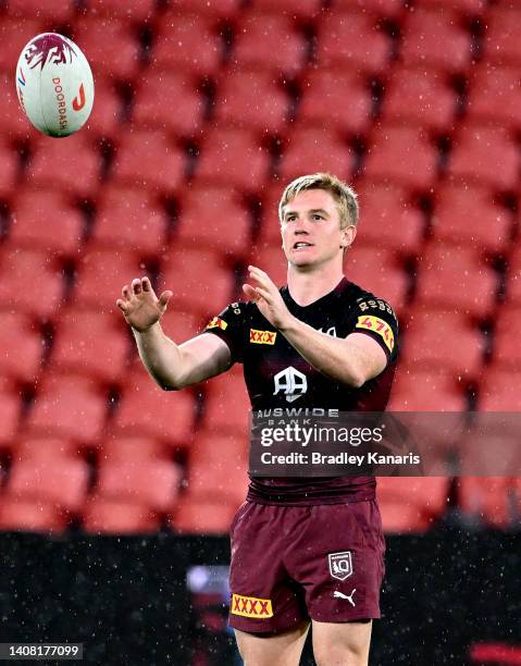 Tom Dearden catches the ball during a Queensland Maroons State of Origin training session at Suncorp Stadium on July 12, 2022 in Brisbane, Australia.