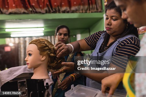 Mid Adult Man Giving Demo Classes Of Hairstyling To Her Employees High-Res Stock Photo - Getty Images Mid Adult Man Giving Demo Classes Of Hairstyling To Her Employees High-Res Stock Photo - Getty Images