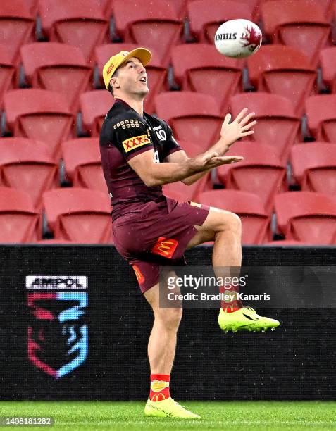 Ben Hunt catches the ball during a Queensland Maroons State of Origin training session at Suncorp Stadium on July 12, 2022 in Brisbane, Australia.
