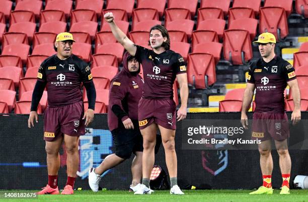 Patrick Carrigan raises his arm in a victory salute during a Queensland Maroons State of Origin training session at Suncorp Stadium on July 12, 2022...