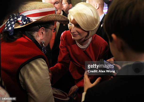 Callista Gingrich wife of Republican presidential candidate and former Speaker of the House Newt Gingrich greets a supporter after being declared the...