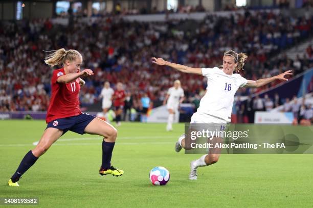 Jill Scott of England tackles Julie Blakstad of Norway during the UEFA Women's Euro England 2022 group A match between England and Norway at Brighton...