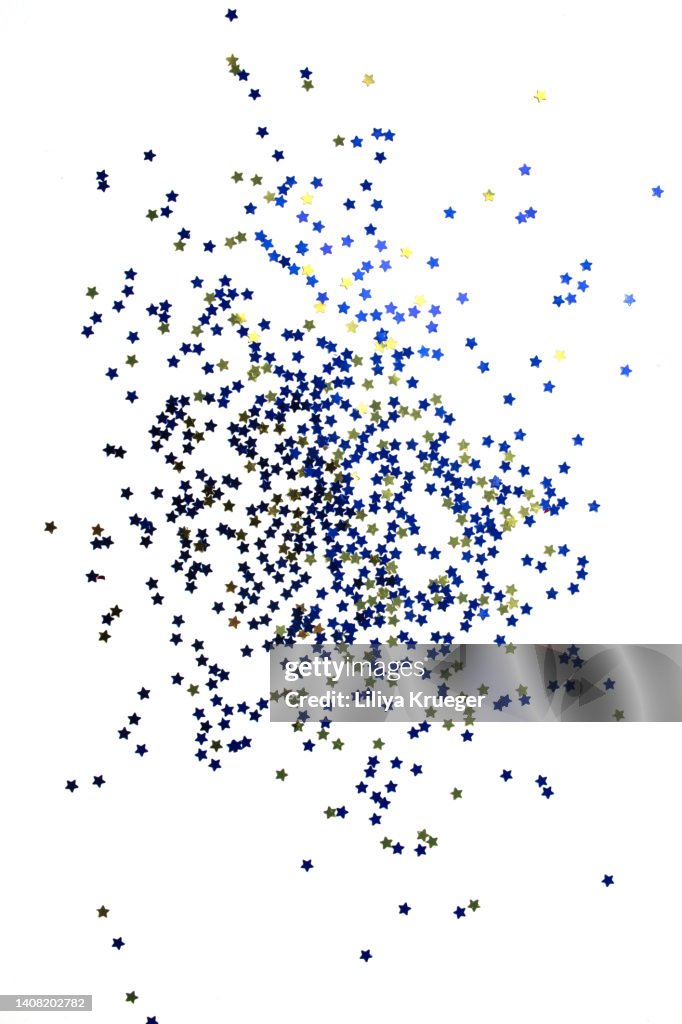 Blue and gold stars isolated on a white background.