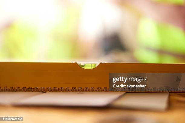 close up of level at construction site. - solid surface stock pictures, royalty-free photos & images