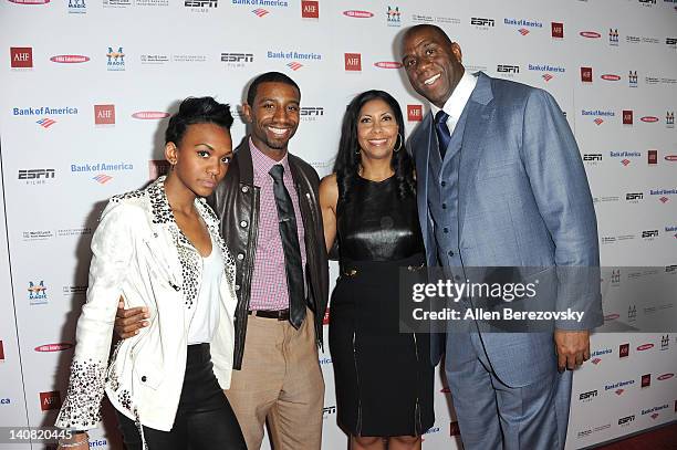 Children Elisa Johnson, Andre Johnson, wife Cookie Johnson and Earvin "Magic" Johnson arrive at the premiere of ESPN Films' "The Announcement" at...
