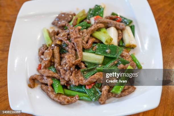 taiwanese cuisine,  stir fried beef with green onion - garlic sauce stock pictures, royalty-free photos & images