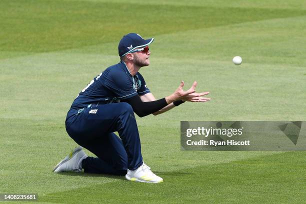 Sam Cook of England Lions catches out Dwaine Pretorius of South Africa during the tour match between England Lions and South Africa at The Cooper...