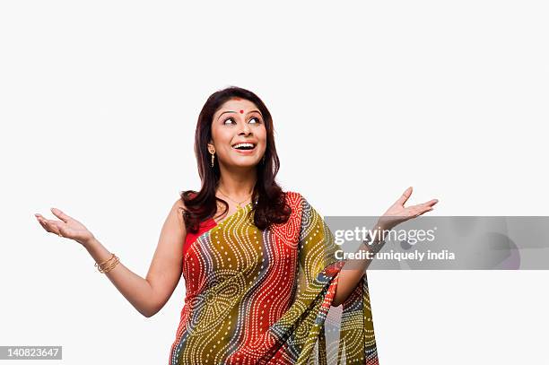 close-up of a woman gesturing - sari isolated stock pictures, royalty-free photos & images