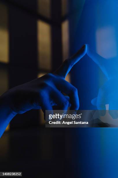 close up view of woman hand using interactive touchscreen display of electronic kiosk - stand exposition stock-fotos und bilder