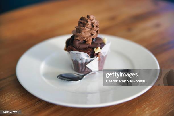 triple chocolate  muffin - dessert topping stock pictures, royalty-free photos & images