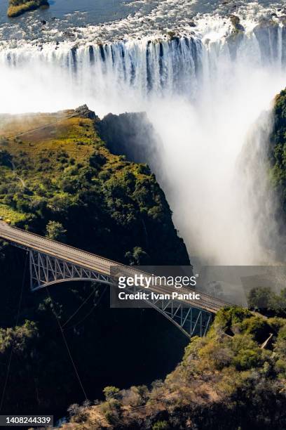 helicopter view of victoria waterfalls in africa - zambezi river stock pictures, royalty-free photos & images