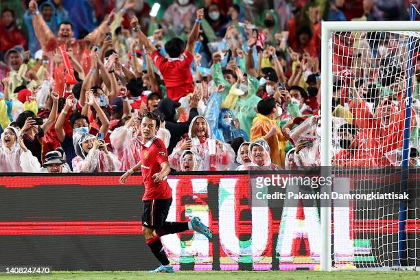 Facundo Pellistri of Manchester United celebrates after scoring his team's fourth goal against Liverpool during the second half of a preseason...