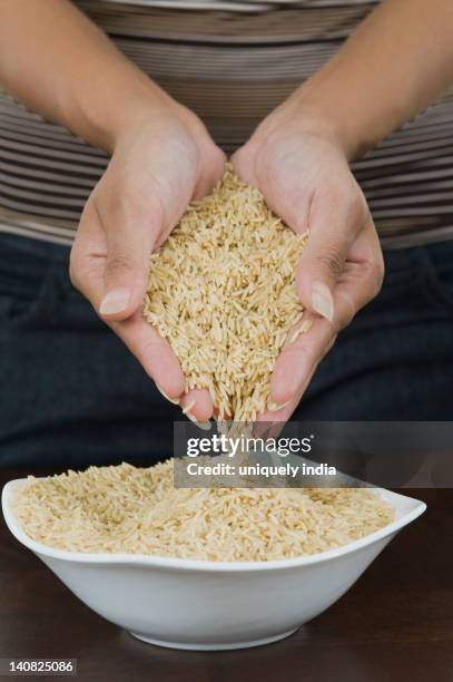 Stocking Up Rice 71 Raw Rice Pouring Stock Photos, High-Res Pictures, and Images - Getty ...