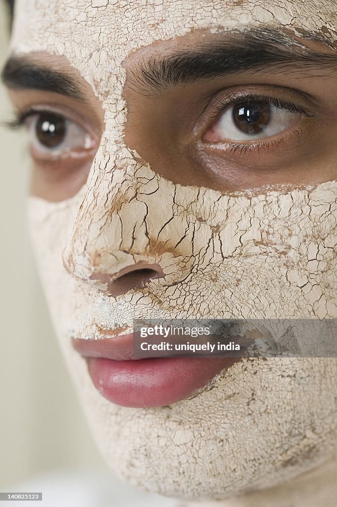 Close-up of a man with facial mask