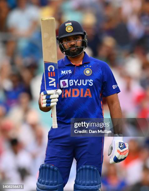 Rohit Sharma of India celebrates reaching his half century during the 1st Royal London Series One Day International between England and India at The...