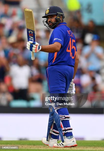 Rohit Sharma of India celebrates reaching his half century during the 1st Royal London Series One Day International between England and India at The...