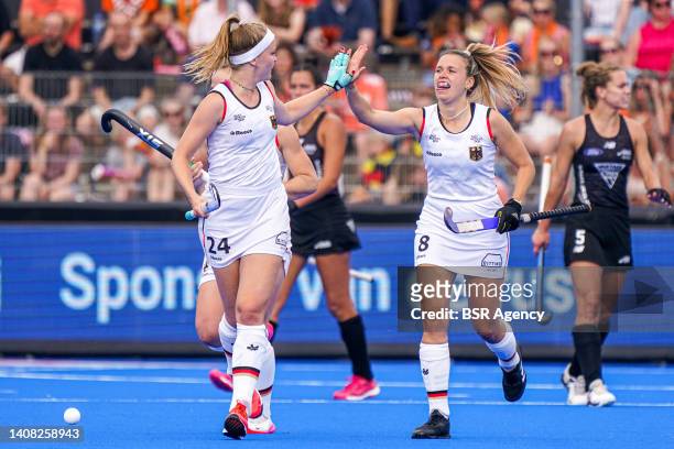 Pia Maertens of Germany, Anne Schroder of Germany celebrate during the FIH Hockey Women's World Cup 2022 match between New Zealand and Germany at the...