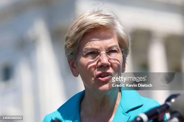 Sen Elizabeth Warren speaks at a press conference on bank overdraft fees on July 12, 2022 in Washington, DC. Warren has reintroduced the Stop...