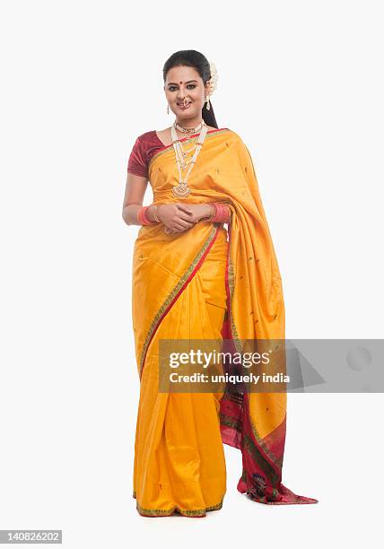 portrait of a woman smiling in traditional clothing - sari isolated stock pictures, royalty-free photos & images