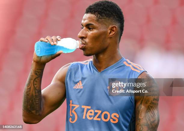Marcus Rashford of Manchester United takes a drink during their open training session at the Rajamangala Stadium on July 11, 2022 in Bangkok,...
