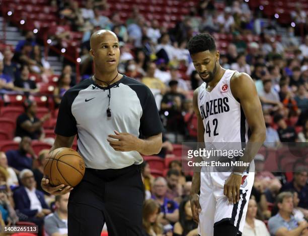Sports analyst and former NBA player Richard Jefferson gets players lined up for a free throw as Kyle Alexander of the Portland Trail Blazers looks...