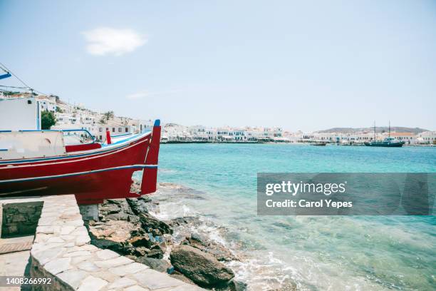 traditional fishing boats and tavernas in mikonos, greece - paros greece stock pictures, royalty-free photos & images