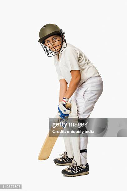 boy playing cricket - cricket player white background stock-fotos und bilder