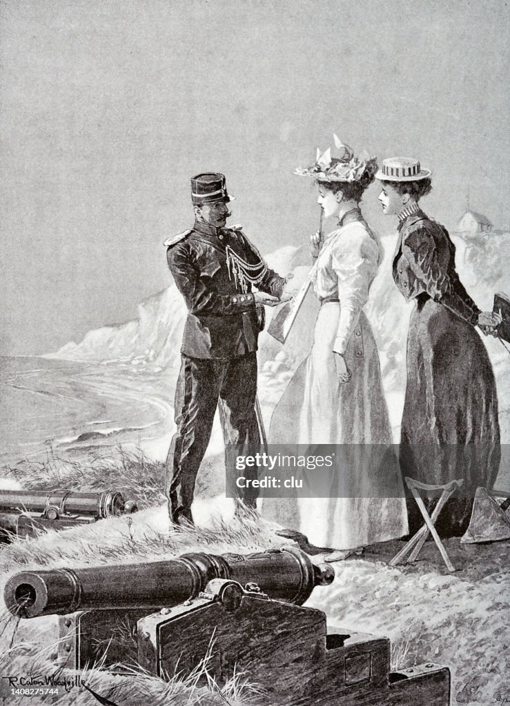 Soldier talks to two young female painters