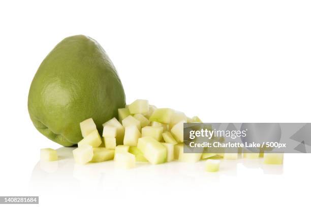 close-up of lemon against white background - apple slice stock pictures, royalty-free photos & images