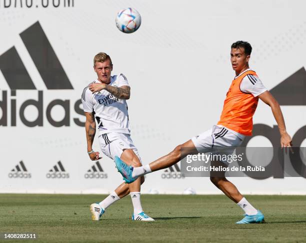 Toni Kroos and Reinier Jesus Carvalho of Real Madrid are training at Valdebebas training ground on July 12, 2022 in Madrid, Spain.