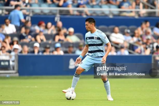 Roger Espinoza of Sporting Kansas City with the ball during a game between New England Revolution and Sporting Kansas City at Children's Mercy Park...