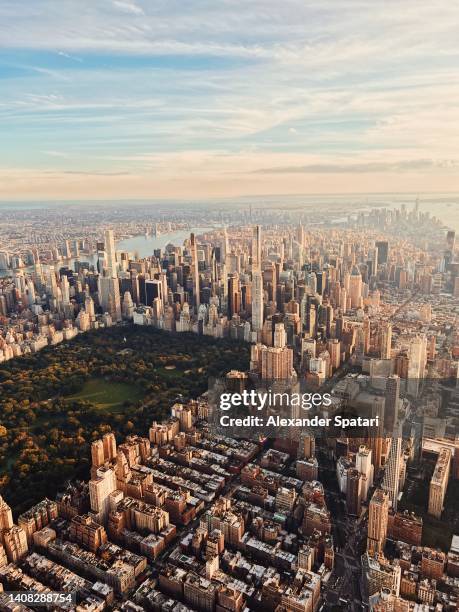 aerial view of new york city skyline at sunset, usa - lower manhattan stock-fotos und bilder