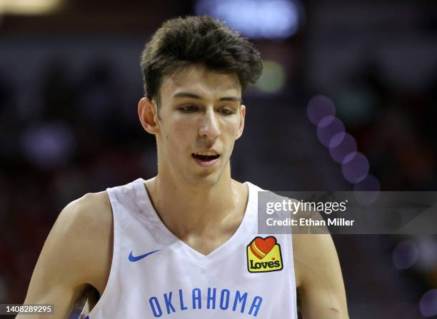 Chet Holmgren of the Oklahoma City Thunder smiles on the court during a game against the Orlando Magic during the 2022 NBA Summer League at the...